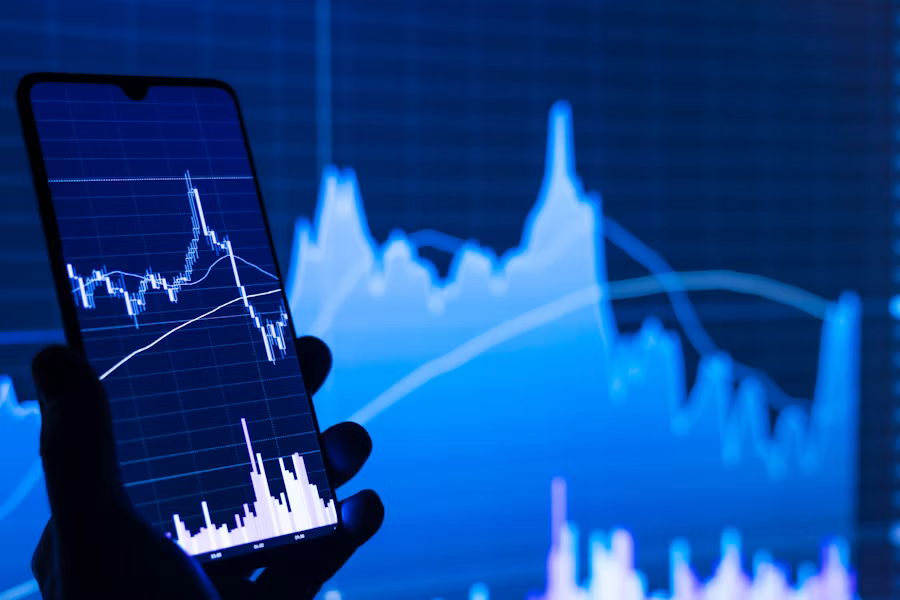 Investor reviewing a stock chart on a mobile device